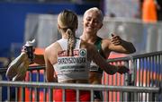 7 March 2025; Sarah Lavin of Ireland, right, is congratulated by Pia Skrzyszowska of Poland after finishing second in the women's 60m hurdles semi-final during day two of the European Athletics Indoor Championships 2025 at the Omnisport Apeldoorn in Apeldoorn, Netherlands. Photo by Sam Barnes/Sportsfile