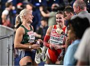 7 March 2025; Sarah Lavin of Ireland, left, shares a joke with Karin Strametz of Austria after finishing second in the women's 60m hurdles semi-final during day two of the European Athletics Indoor Championships 2025 at the Omnisport Apeldoorn in Apeldoorn, Netherlands. Photo by Sam Barnes/Sportsfile