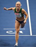 7 March 2025; Sarah Lavin of Ireland crosses the finish line to finish second in the women's 60m hurdles semi-final during day two of the European Athletics Indoor Championships 2025 at the Omnisport Apeldoorn in Apeldoorn, Netherlands. Photo by Sam Barnes/Sportsfile