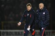 7 March 2025; Shelbourne manager Damien Duff, left, and assistant manager Joey O'Brien leave the pitch at half-time during the SSE Airtricity Men's Premier Division match between Shelbourne and Drogheda United at Tolka Park in Dublin. Photo by Seb Daly/Sportsfile