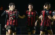 7 March 2025; Colm Whelan of Bohemians, 9, celebrates with team-mates after scoring their side's third goal, for his hat-trick, during the SSE Airtricity Men's Premier Division match between Waterford and Bohemians at the Regional Sports Centre in Waterford. Photo by Piaras Ó Mídheach/Sportsfile