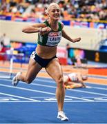 7 March 2025; Sarah Lavin of Ireland crosses the finish line to finish fourth in the women's 60m hurdles final during day two of the European Athletics Indoor Championships 2025 at the Omnisport Apeldoorn in Apeldoorn, Netherlands. Photo by Sam Barnes/Sportsfile
