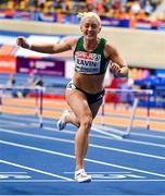7 March 2025; Sarah Lavin of Ireland crosses the finish line to finish fourth in the women's 60m hurdles final during day two of the European Athletics Indoor Championships 2025 at the Omnisport Apeldoorn in Apeldoorn, Netherlands. Photo by Sam Barnes/Sportsfile