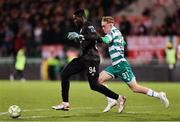 7 March 2025; St Patrick's Athletic goalkeeper Joseph Anang in action against Michael Noonan of Shamrock Rovers during the SSE Airtricity Men's Premier Division match between Shamrock Rovers and St Patrick's Athletic at Tallaght Stadium in Dublin. Photo by Thomas Flinkow/Sportsfile
