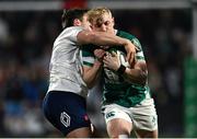 7 March 2025; Clark Logan of Ireland is tackled by Jean Cotarmanac'h of France during the U20 Six Nations Rugby Championship match between Ireland and France at Virgin Media Park in Cork. Photo by Brendan Moran/Sportsfile