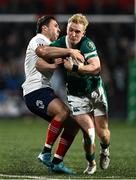7 March 2025; Clark Logan of Ireland is tackled by Jean Cotarmanac'h of France during the U20 Six Nations Rugby Championship match between Ireland and France at Virgin Media Park in Cork. Photo by Brendan Moran/Sportsfile