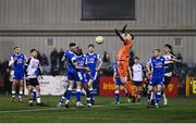 7 March 2025; Lee Devitt of Treaty United, centre, scores his side's second goal past Dundalk goalkeeper Peter Cherrie during the SSE Airtricity Men's Premier Division match between Dundalk and Treaty United at Oriel Park in Dundalk, Louth. Photo by Ben McShane/Sportsfile