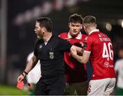 7 March 2025; Conor Reynolds of Sligo Rovers, right, is shown a red card by referee Eoghan O'Shea during the SSE Airtricity Men's Premier Division match between Cork City and Sligo Rovers at Turner's Cross in Cork. Photo by Michael P Ryan/Sportsfile