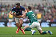 8 March 2025; Thomas Ramos of France is tackled by Robbie Henshaw of Ireland during the Guinness Six Nations Rugby Championship match between Ireland and France at the Aviva Stadium in Dublin. Photo by David Fitzgerald/Sportsfile