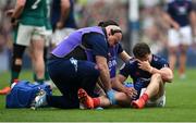 8 March 2025; Antoine Dupont of France reacts as he receives medical attention during the Guinness Six Nations Rugby Championship match between Ireland and France at the Aviva Stadium in Dublin. Photo by David Fitzgerald/Sportsfile