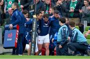 8 March 2025; Antoine Dupont of France is assisted from the pitch after sustaining an injury during the Guinness Six Nations Rugby Championship match between Ireland and France at the Aviva Stadium in Dublin. Photo by Brendan Moran/Sportsfile