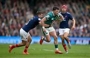 8 March 2025; Calvin Nash of Ireland is tackled by Thomas Ramos of France during the Guinness Six Nations Rugby Championship match between Ireland and France at the Aviva Stadium in Dublin. Photo by Brendan Moran/Sportsfile