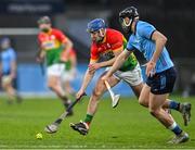 8 March 2025; Ciaran Whelan of Carlow in action against Ronan Hayes of Dublin during the Allianz Hurling League Division 1B match between Dublin and Carlow at Parnell Park in Dublin. Photo by Stephen Marken/Sportsfile