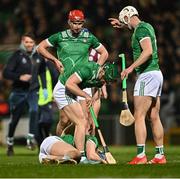 8 March 2025; Mike Casey of Limerick awaits medical attention for an injury as team-mates check on him during the Allianz Hurling League Division 1A match between Limerick and Galway at TUS Gaelic Grounds in Limerick. Photo by Piaras Ó Mídheach/Sportsfile