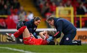 8 March 2025; Kate Mooney of Shelbourne receives medical attention from physiotherapist Nicole Brindle and team doctor Robin McManus during the SSE Airtricity Women's Premier Division match between Shelbourne and Shamrock Rovers at Tolka Park in Dublin. Photo by Stephen McCarthy/Sportsfile