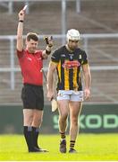 9 March 2025; Mikey Carey of Kilkenny is shown a red card by referee Sean Stack during the Allianz Hurling League Division 1A match between Kilkenny and Tipperary at UPMC Nowlan Park in Kilkenny. Photo by Stephen McCarthy/Sportsfile