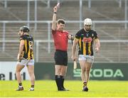 9 March 2025; Mikey Carey of Kilkenny is shown a red card by referee Sean Stack during the Allianz Hurling League Division 1A match between Kilkenny and Tipperary at UPMC Nowlan Park in Kilkenny. Photo by Stephen McCarthy/Sportsfile