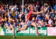 9 March 2025; Brian Hayes of Cork scores his side's third goal, as Conor Cleary of Clare gives chase, during the Allianz Hurling League Division 1A match between Clare and Cork at Zimmer Biomet Páirc Chíosóg in Ennis, Clare. Photo by Piaras Ó Mídheach/Sportsfile