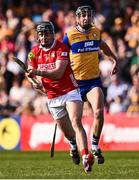 9 March 2025; Darragh Fitzgibbon of Cork in action against Cathal Malone of Clare during the Allianz Hurling League Division 1A match between Clare and Cork at Zimmer Biomet Páirc Chíosóg in Ennis, Clare. Photo by Piaras Ó Mídheach/Sportsfile