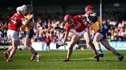 9 March 2025; Brian Hayes of Cork and John Conlon of Clare go for the ball as Adam Hogan of Clare and Patrick Horgan of Cork tussle off the ball during the Allianz Hurling League Division 1A match between Clare and Cork at Zimmer Biomet Páirc Chíosóg in Ennis, Clare. Photo by Piaras Ó Mídheach/Sportsfile