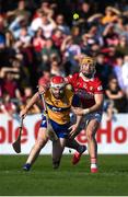 9 March 2025; Conor Leen of Clare in action against Declan Dalton of Cork during the Allianz Hurling League Division 1A match between Clare and Cork at Zimmer Biomet Páirc Chíosóg in Ennis, Clare.  Photo by John Sheridan/Sportsfile
