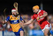 9 March 2025; Declan Dalton of Cork in action against Conor Leen of Clare during the Allianz Hurling League Division 1A match between Clare and Cork at Zimmer Biomet Páirc Chíosóg in Ennis, Clare.  Photo by John Sheridan/Sportsfile