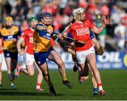 9 March 2025; Tim O'Mahony of Cork in action against David Fitzgerald of Clare during the Allianz Hurling League Division 1A match between Clare and Cork at Zimmer Biomet Páirc Chíosóg in Ennis, Clare.  Photo by John Sheridan/Sportsfile