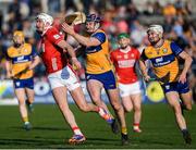 9 March 2025; Tim O'Mahony of Cork in action against David Fitzgerald of Clare during the Allianz Hurling League Division 1A match between Clare and Cork at Zimmer Biomet Páirc Chíosóg in Ennis, Clare.  Photo by John Sheridan/Sportsfile