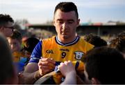 9 March 2025; Ryan Taylor of Clare signs autographs after the Allianz Hurling League Division 1A match between Clare and Cork at Zimmer Biomet Páirc Chíosóg in Ennis, Clare.  Photo by John Sheridan/Sportsfile