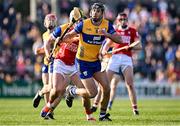 9 March 2025; Cathal Malone of Clare in action against Darragh Fitzgibbon of Cork during the Allianz Hurling League Division 1A match between Clare and Cork at Zimmer Biomet Páirc Chíosóg in Ennis, Clare. Photo by Piaras Ó Mídheach/Sportsfile