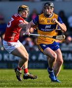 9 March 2025; Tony Kelly of Clare in action against Brian Roche of Cork during the Allianz Hurling League Division 1A match between Clare and Cork at Zimmer Biomet Páirc Chíosóg in Ennis, Clare. Photo by Piaras Ó Mídheach/Sportsfile