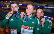 9 March 2025; Team Ireland athletes, from left, Mark English with his bronze medal from the men's 800m, Sarah Healy with her gold medal from the women's 3000m and Kate O'Connor with her bronze medal from the women's pentathlon on day four of the European Athletics Indoor Championships 2025 at the Omnisport Apeldoorn in Apeldoorn, Netherlands. Photo by Sam Barnes/Sportsfile