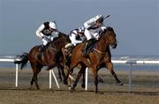 9 September 2004; Moon At Midnight, right, with Mr Jamie Codd up races clear of My Raggedy Man, left, with Denis Cullen up and Caviar Royale, center, with Mr Derek O'Connor up on their way to winning the Hibernia Steel (Q.R.) Handicap. Laytown Strand Races, Laytown, Co. Meath. Picture credit; Damien Eagers / SPORTSFILE