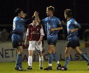 10 September 2004; Dominic Foley, center, Bohemians, celebrates with team-mates Stephen Ward, left, and Kevin Hunt after scoring his sides second goal. eircom League, Premier Division, St. Patrick's Athletic v Bohemians, Richmond Park, Dublin. Picture credit; Brian Lawless / SPORTSFILE