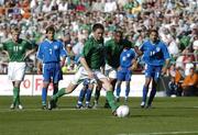 4 September 2004; Republic of Ireland's Robbie Keane shoots from the penalty spot to score his sides third goal. FIFA World Cup Qualifier, Republic of Ireland v Cyprus, Lansdowne Road, Dublin. Picture credit; Brian Lawless / SPORTSFILE