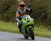 12 September 2004; Ryan Raquhar, Dungannon, Lowcost Kawasaki, salutes the crowd after winning the 600cc A race during the 2004 Killalane Road Races, Skerries, Co. Dublin. Picture credit; Pat Murphy / SPORTSFILE