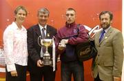 11 September 2004; Tony Hayes, Handball President, presents the trophy to Westmeath's Robert McCarthy with Coca Cola Events manager Louise Keane and Sean Kelly, President of the GAA, right. Coca Cola All-Ireland 60 x 30 Handball Finals, Minor Singles Event, Patrick Hurney, Waterford v Robert McCarthy, Westmeath, Croke Park, Dublin. Picture credit; Pat Murphy / SPORTSFILE