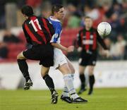 11 September 2004; Michael Collins, Athlone Town, in action against John Martin, Longford Town. FAI Cup Quarter-Final, Longford Town v Athlone Town, Flancare Park, Longford. Picture credit; David Maher / SPORTSFILE