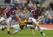 12 September 2004; Kevin Hynes, Galway, in action against Pat Hartley, Kilkenny. All-Ireland Minor Hurling Championship Final, Galway v Kilkenny, Croke Park, Dublin. Picture credit; Brendan Moran / SPORTSFILE *** Local Caption *** Any photograph taken by SPORTSFILE during, or in connection with, the 2004 Guinness All-Ireland Hurling Final which displays GAA logos or contains an image or part of an image of any GAA intellectual property, or, which contains images of a GAA player/players in their playing uniforms, may only be used for editorial and non-advertising purposes.  Use of photographs for advertising, as posters or for purchase separately is strictly prohibited unless prior written approval has been obtained from the Gaelic Athletic Association.
