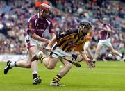 12 September 2004; Richard Hogan, Kilkenny, in action against Ciaran Hogan, Galway. All-Ireland Minor Hurling Championship Final, Galway v Kilkenny, Croke Park, Dublin. Picture credit; Brian Lawless / SPORTSFILE *** Local Caption *** Any photograph taken by SPORTSFILE during, or in connection with, the 2004 Guinness All-Ireland Hurling Final which displays GAA logos or contains an image or part of an image of any GAA intellectual property, or, which contains images of a GAA player/players in their playing uniforms, may only be used for editorial and non-advertising purposes.  Use of photographs for advertising, as posters or for purchase separately is strictly prohibited unless prior written approval has been obtained from the Gaelic Athletic Association.