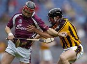 12 September 2004; Joe Canning, Galway, in action against Kieran Joyce, Kilkenny. All-Ireland Minor Hurling Championship Final, Galway v Kilkenny, Croke Park, Dublin. Picture credit; Ray McManus / SPORTSFILE *** Local Caption *** Any photograph taken by SPORTSFILE during, or in connection with, the 2004 Guinness All-Ireland Hurling Final which displays GAA logos or contains an image or part of an image of any GAA intellectual property, or, which contains images of a GAA player/players in their playing uniforms, may only be used for editorial and non-advertising purposes.  Use of photographs for advertising, as posters or for purchase separately is strictly prohibited unless prior written approval has been obtained from the Gaelic Athletic Association.
