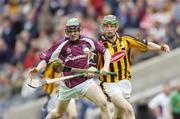 12 September 2004; Kevin Hynes, Galway, in action against Ronan Maher, Kilkenny. All-Ireland Minor Hurling Championship Final, Galway v Kilkenny, Croke Park, Dublin. Picture credit; Ray McManus / SPORTSFILE *** Local Caption *** Any photograph taken by SPORTSFILE during, or in connection with, the 2004 Guinness All-Ireland Hurling Final which displays GAA logos or contains an image or part of an image of any GAA intellectual property, or, which contains images of a GAA player/players in their playing uniforms, may only be used for editorial and non-advertising purposes.  Use of photographs for advertising, as posters or for purchase separately is strictly prohibited unless prior written approval has been obtained from the Gaelic Athletic Association.