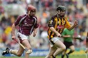 12 September 2004; Gavin Nolan, Kilkenny, in action against Ciaran O'Donavan, Galway. All-Ireland Minor Hurling Championship Final, Galway v Kilkenny, Croke Park, Dublin. Picture credit; Damien Eagers / SPORTSFILE *** Local Caption *** Any photograph taken by SPORTSFILE during, or in connection with, the 2004 Guinness All-Ireland Hurling Final which displays GAA logos or contains an image or part of an image of any GAA intellectual property, or, which contains images of a GAA player/players in their playing uniforms, may only be used for editorial and non-advertising purposes.  Use of photographs for advertising, as posters or for purchase separately is strictly prohibited unless prior written approval has been obtained from the Gaelic Athletic Association.