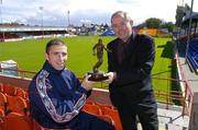 13 September 2004; Shelbourne's Owen Heary is presented with the eircom Soccer Writers Association of Ireland Player of the Month for August by Padraig Corkery, Sponsorship Manager, eircom, in Tolka Park, Dublin. Picture credit; Brendan Moran / SPORTSFILE