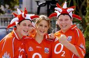 13 September 2004; Cork supporters, l to r, are Ross O'Mahoney, Sandra Cashman and Alan Barry all from Carrigtohill celebrate after Cork's victory in the All Ireland hurling final. Burlington Hotel, Dublin. Picture credit; Damien Eagers / SPORTSFILE