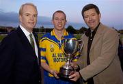 11 September 2004; Billy Finn, General Manager AIB Bank, right, presents the cup to Portumna captain Ollie Canning in the company of American Ambassador James J. Kenny, left. AIB Kilmacud Crokes All-Ireland Hurling Sevens 2004 Final, Portumna v Mullinahone, Kilmacud Crokes, Glenalbyn, Stillorgan, Dublin. Picture credit; Ray McManus / SPORTSFILE