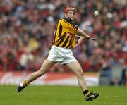 12 September 2004; Tommy Walsh, Kilkenny. Guinness All-Ireland Senior Hurling Championship Final, Cork v Kilkenny, Croke Park, Dublin. Picture credit; Brendan Moran / SPORTSFILE *** Local Caption *** Any photograph taken by SPORTSFILE during, or in connection with, the 2004 Guinness All-Ireland Hurling Final which displays GAA logos or contains an image or part of an image of any GAA intellectual property, or, which contains images of a GAA player/players in their playing uniforms, may only be used for editorial and non-advertising purposes.  Use of photographs for advertising, as posters or for purchase separately is strictly prohibited unless prior written approval has been obtained from the Gaelic Athletic Association. *** Local Caption *** Any photograph taken by SPORTSFILE during, or in connection with, the 2004 Guinness All-Ireland Hurling Final which displays GAA logos or contains an image or part of an image of any GAA intellectual property, or, which contains images of a GAA player/players in their playing uniforms, may only be used for editorial and non-advertising purposes.  Use of photographs for advertising, as posters or for purchase separately is strictly prohibited unless prior written approval has been obtained from the Gaelic Athletic Association.