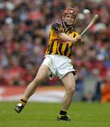 12 September 2004; Tommy Walsh, Kilkenny. Guinness All-Ireland Senior Hurling Championship Final, Cork v Kilkenny, Croke Park, Dublin. Picture credit; Brendan Moran / SPORTSFILE *** Local Caption *** Any photograph taken by SPORTSFILE during, or in connection with, the 2004 Guinness All-Ireland Hurling Final which displays GAA logos or contains an image or part of an image of any GAA intellectual property, or, which contains images of a GAA player/players in their playing uniforms, may only be used for editorial and non-advertising purposes.  Use of photographs for advertising, as posters or for purchase separately is strictly prohibited unless prior written approval has been obtained from the Gaelic Athletic Association. *** Local Caption *** Any photograph taken by SPORTSFILE during, or in connection with, the 2004 Guinness All-Ireland Hurling Final which displays GAA logos or contains an image or part of an image of any GAA intellectual property, or, which contains images of a GAA player/players in their playing uniforms, may only be used for editorial and non-advertising purposes.  Use of photographs for advertising, as posters or for purchase separately is strictly prohibited unless prior written approval has been obtained from the Gaelic Athletic Association.