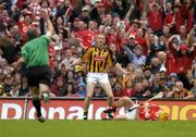 12 September 2004; Referee Oadan MacSuibhne whistles for a free after Kilkenny's James Ryall fouled Cork's Joe Deane. Guinness All-Ireland Senior Hurling Championship Final, Cork v Kilkenny, Croke Park, Dublin. Picture credit; Brendan Moran / SPORTSFILE *** Local Caption *** Any photograph taken by SPORTSFILE during, or in connection with, the 2004 Guinness All-Ireland Hurling Final which displays GAA logos or contains an image or part of an image of any GAA intellectual property, or, which contains images of a GAA player/players in their playing uniforms, may only be used for editorial and non-advertising purposes.  Use of photographs for advertising, as posters or for purchase separately is strictly prohibited unless prior written approval has been obtained from the Gaelic Athletic Association.