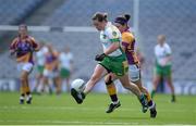 29 September 2013; Siobhan Flannery, Offaly, in action against Leona Tector, Wexford. TG4 All-Ireland Ladies Football Junior Championship Final, Offaly v Wexford, Croke Park, Dublin. Picture credit: Brendan Moran / SPORTSFILE